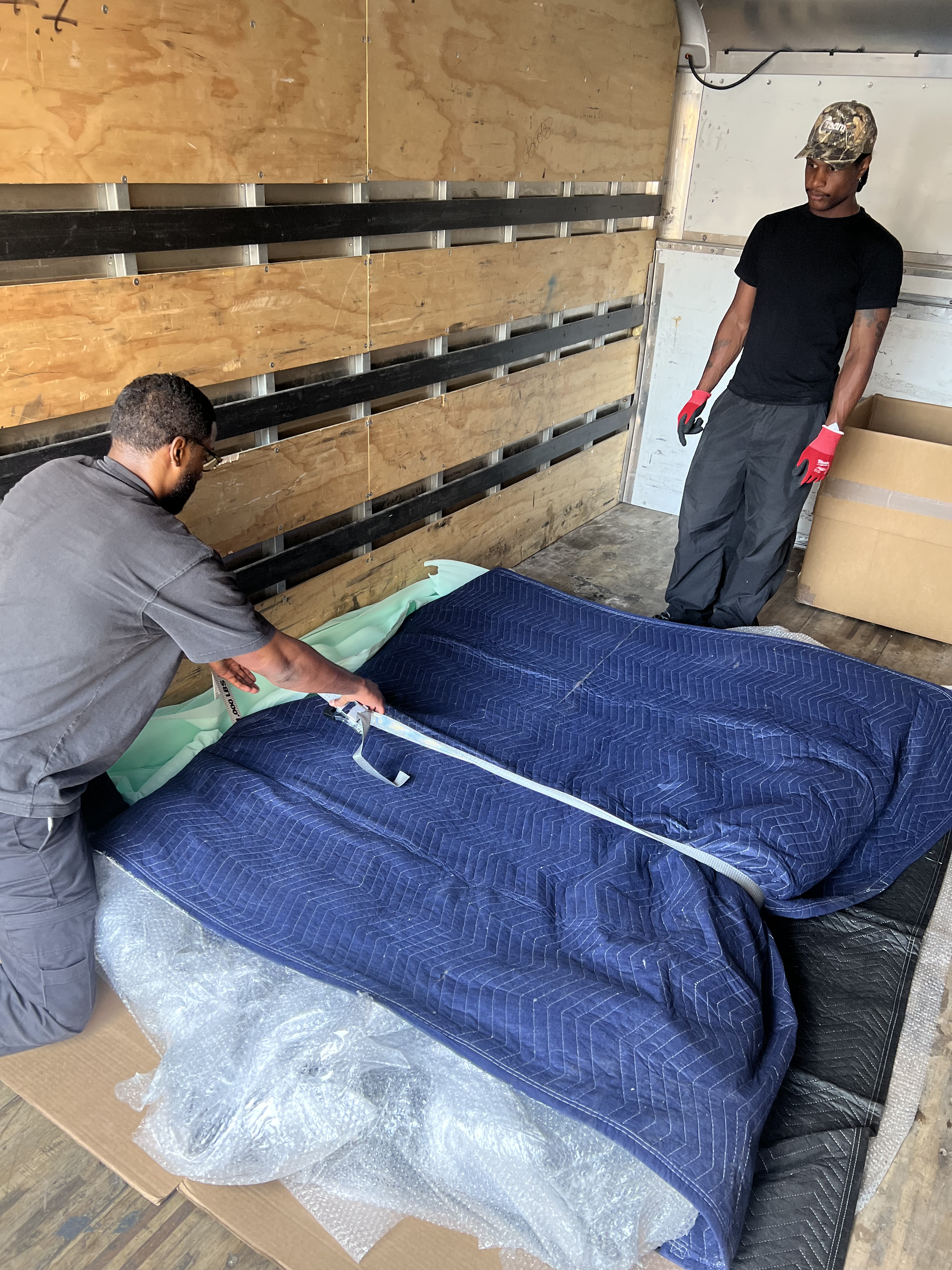 Art transport vehicle being loaded