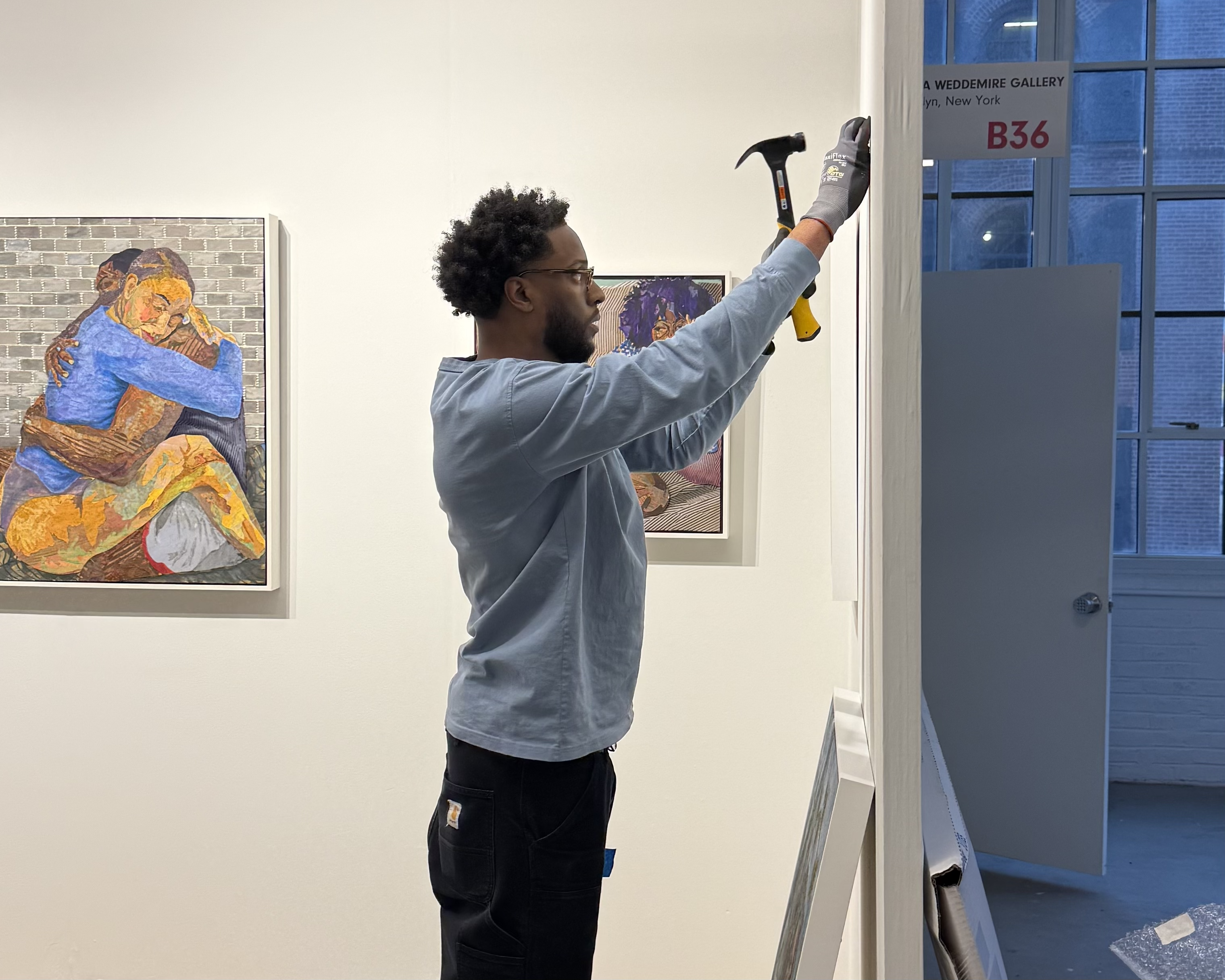 Professional art installation on gallery wall