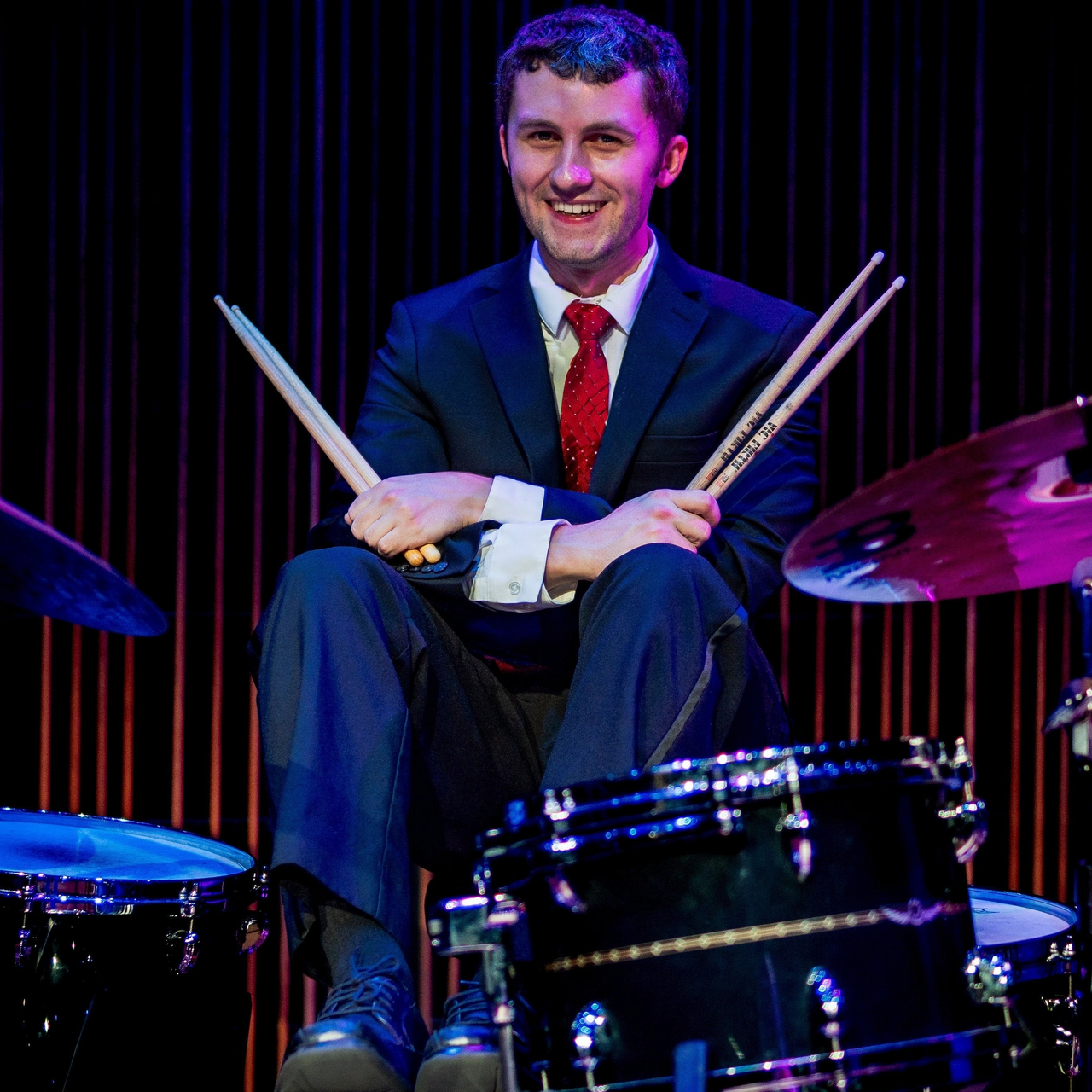 jackson on drum set picture 2 (1).png