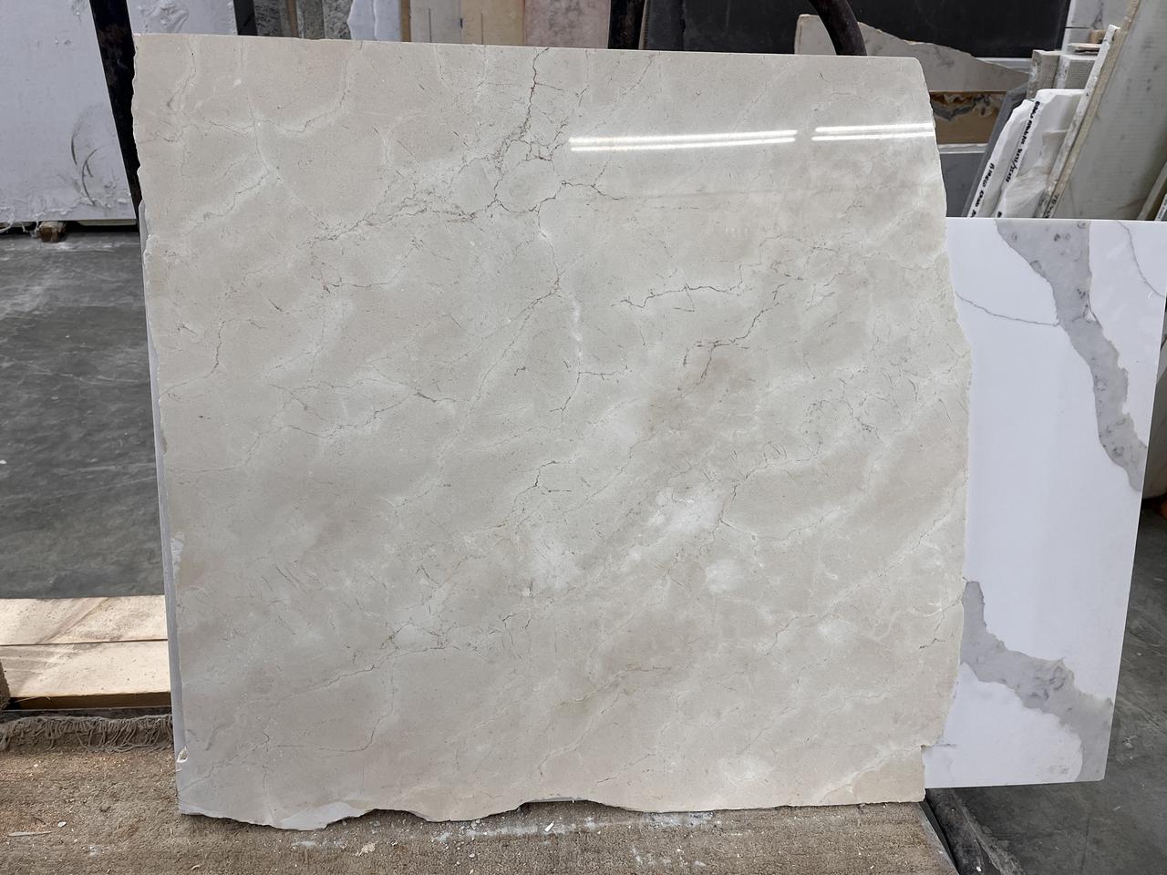 crema marfil 2cm 28x30.jpg