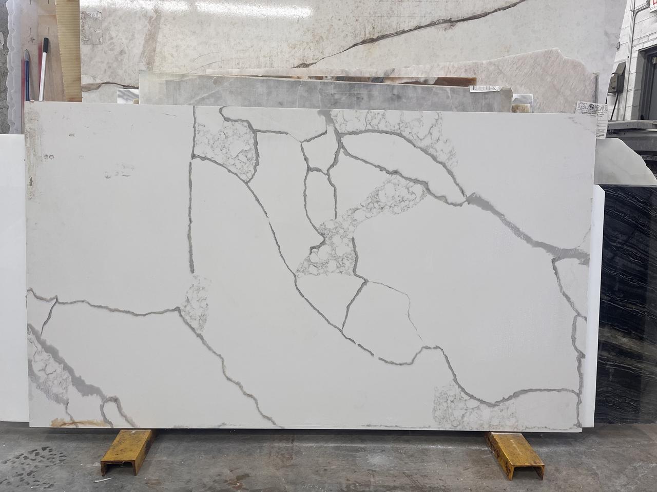calacatta brescia quartz 56x32.jpg