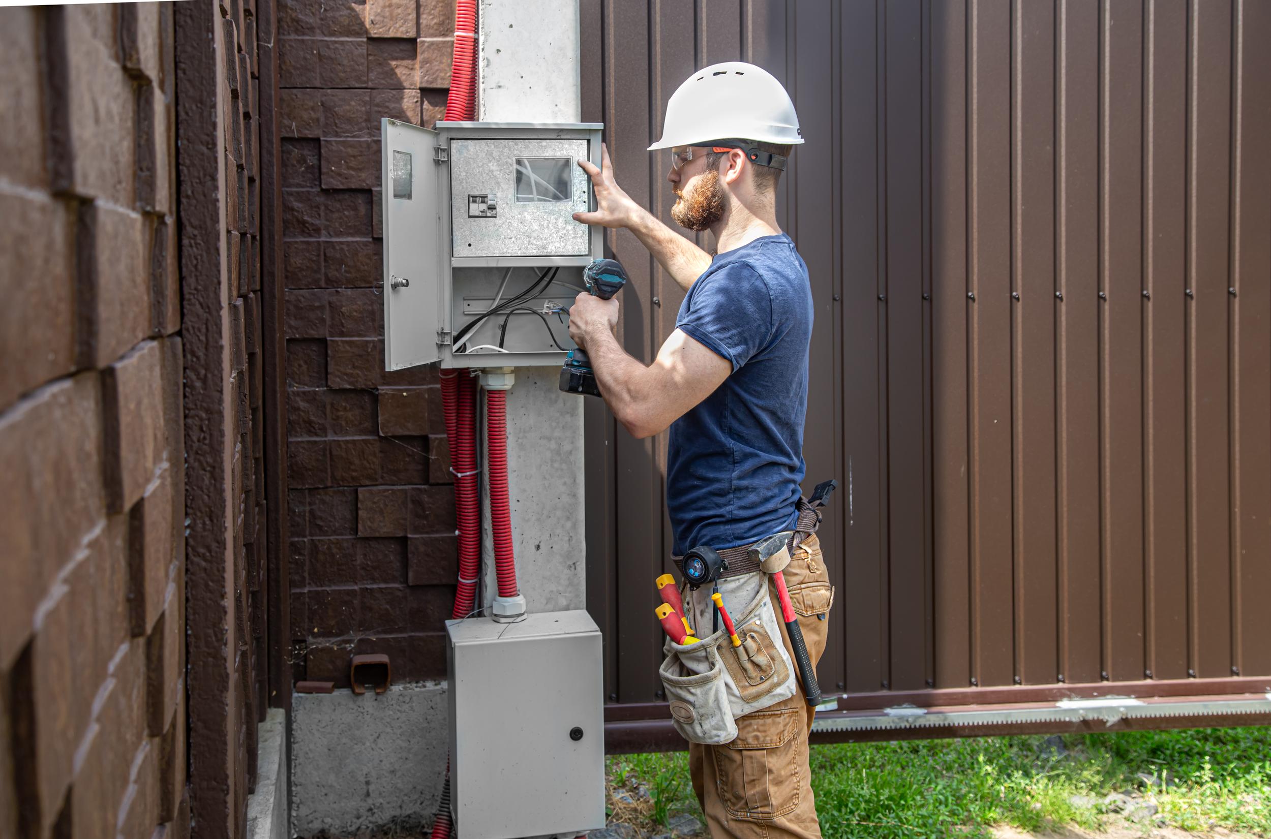 electrician-builder-at-work-examines-the-cable-co-2026-01-08-22-28-25-utc.jpg