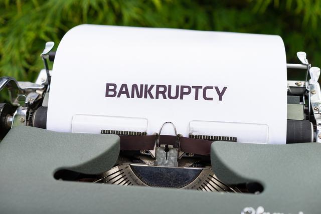 typewriter with &#x27;bankruptcy&#x27; typed on the paper