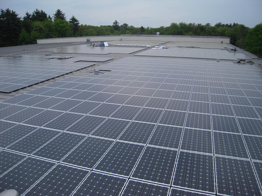 Solar panels on top of a recycling building.