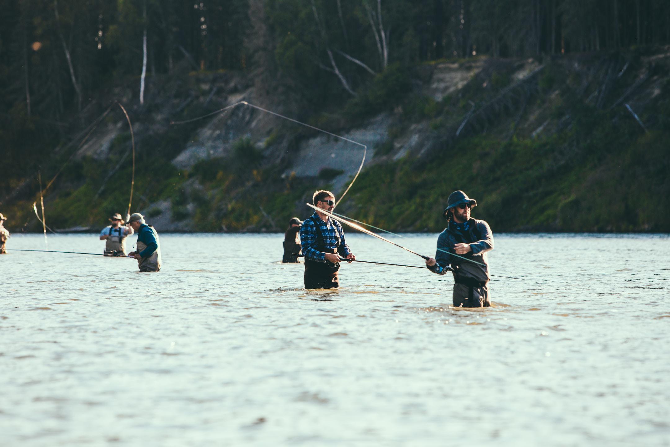 Image of people taking a wading fishing tour in Arkansas.