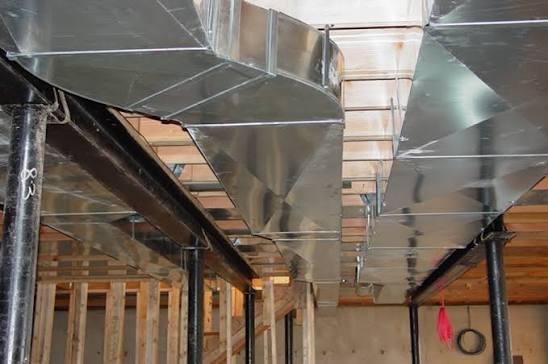 Rectangular trunk ductwork system in basement installation