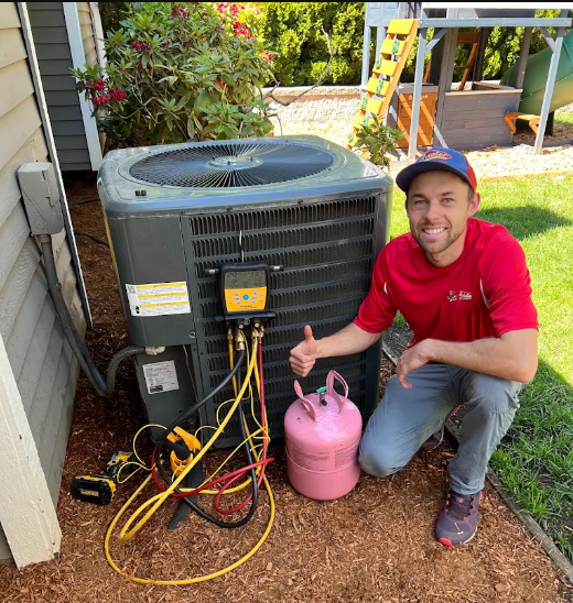 Professional HVAC technician performing AC repair