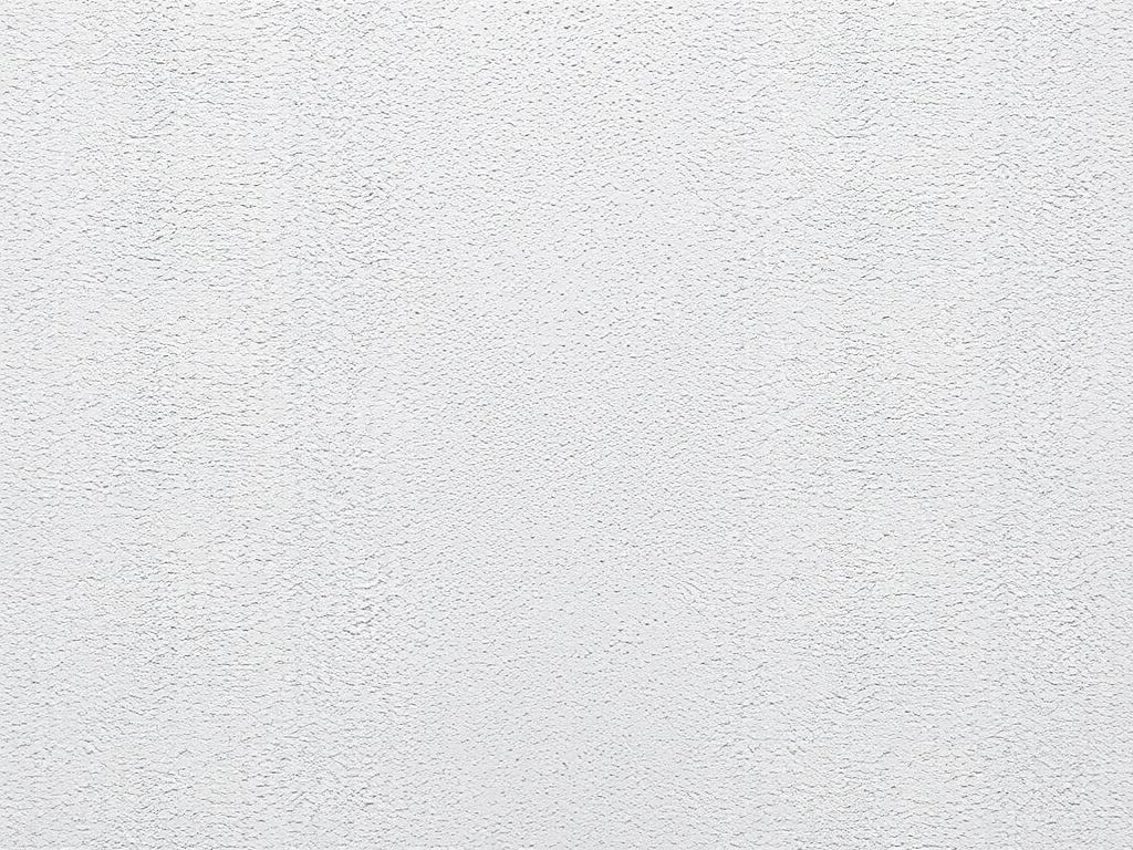 A close-up shot of a freshly applied rubberized urethane coating on a stucco wall, showcasing a smooth and shiny finish. The background should be minimalistic, focusing on the texture and quality of the coating. The shot should be captured using a 45mm f/1.2 lens to highlight the details.