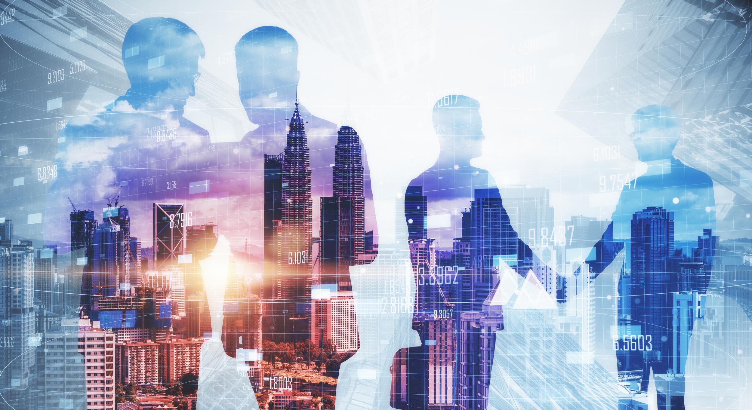 businessmen-silhouettes-working-together-on-blurry-2026-01-11-08-35-58-utc.jpg