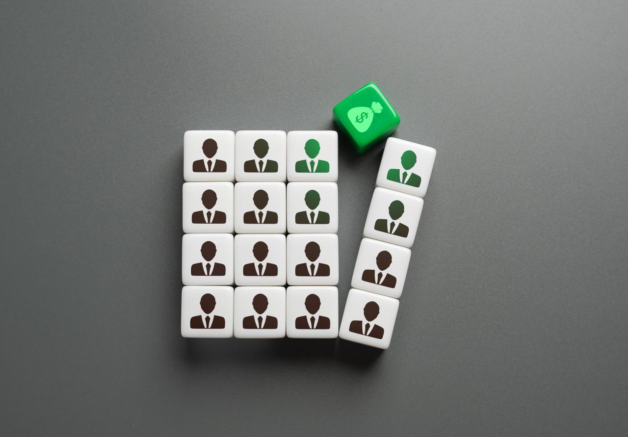 green-money-bag-on-domino-tiles-2026-03-24-02-53-49-utc.jpg