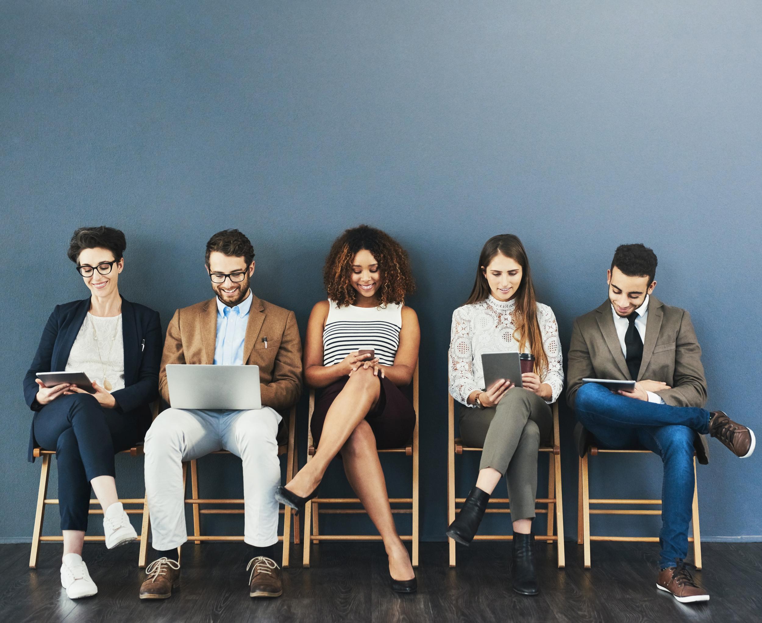 professionals-with-technology-devices-sitting-and-2026-01-09-09-58-45-utc.jpg