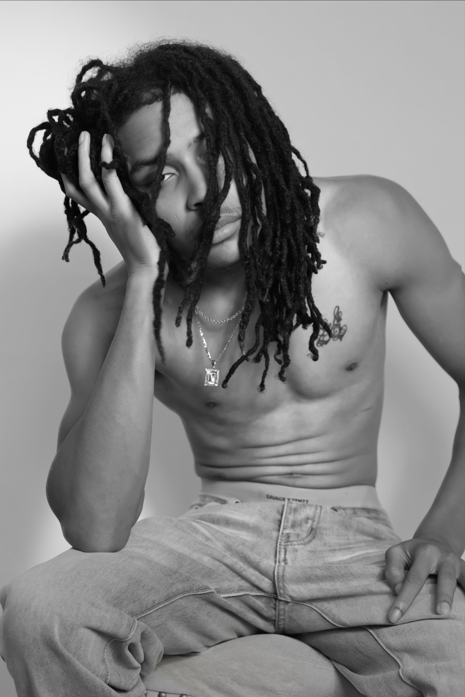 Black-and-white portrait from a studio session.