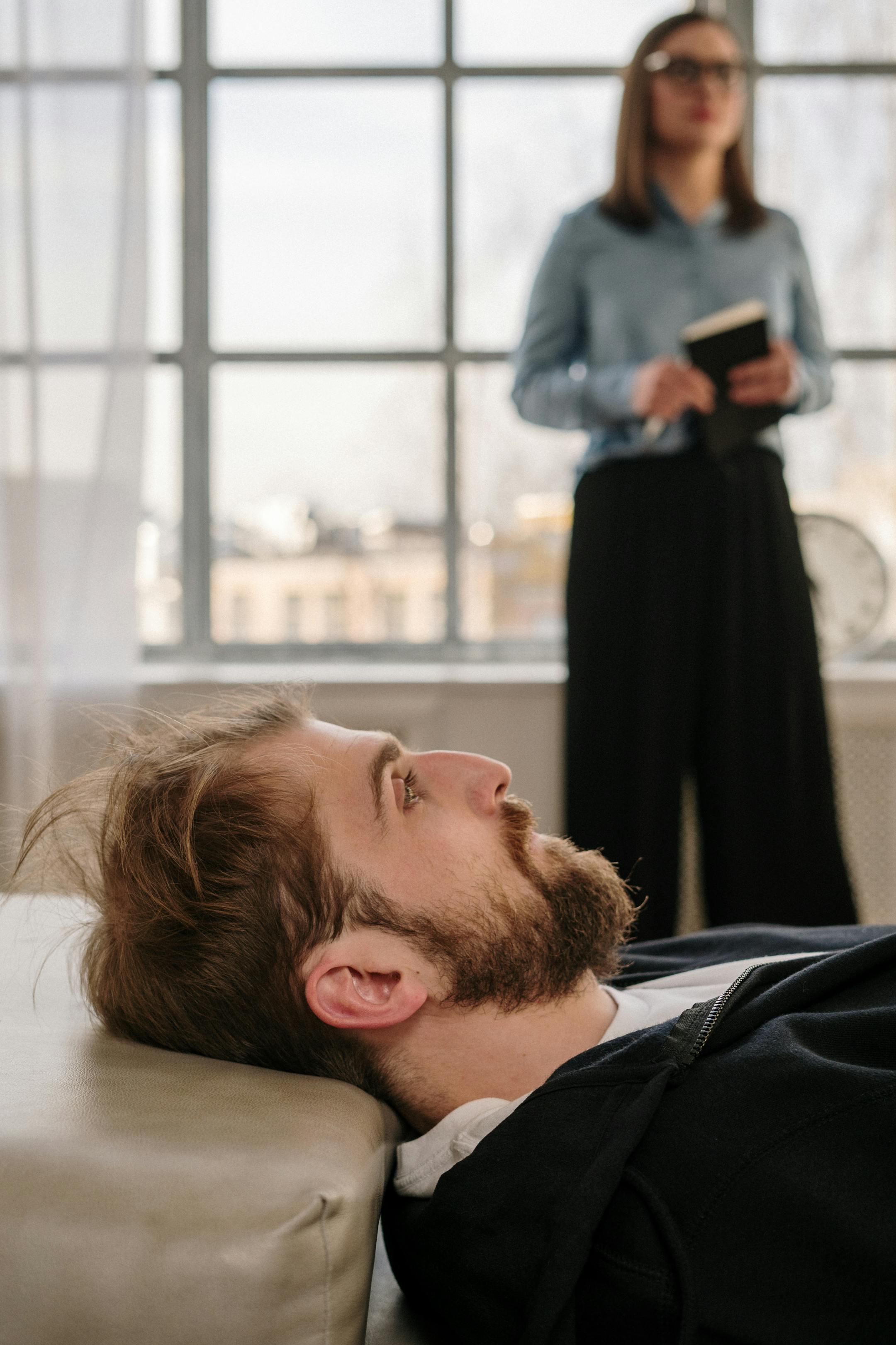 Therapist and client in session discussing mental health, symbolizing when to see a licensed psychologist in Lebanon.