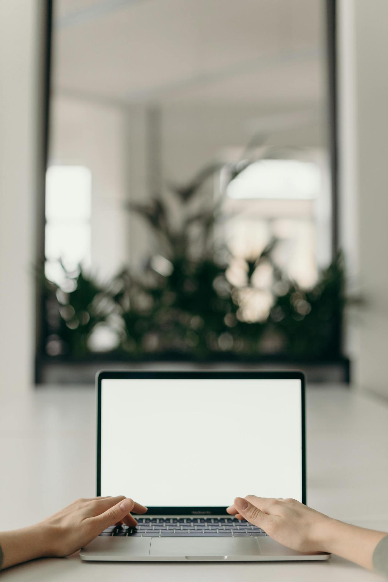 <code>An open laptop in a bright, serene indoor setting representing a secure online therapy session with Cognitive Analytica</code><ul><li></li></ul>