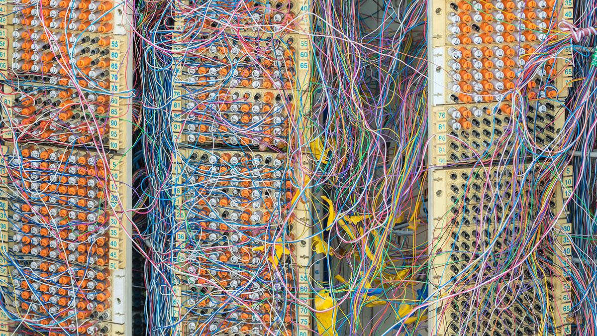 Interconnected wires symbolizing complex psychological needs and treatment pathways