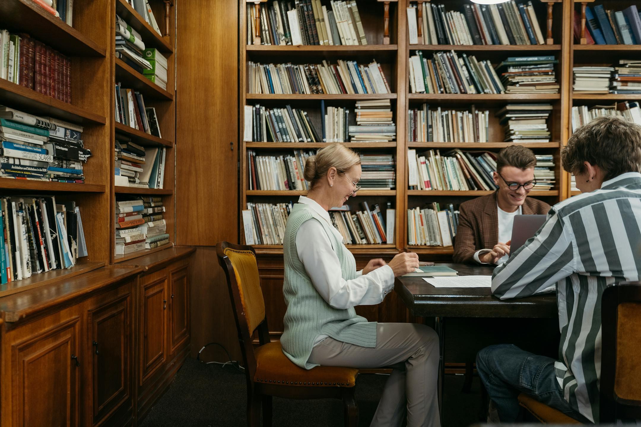 Group of people studying together in a library setting