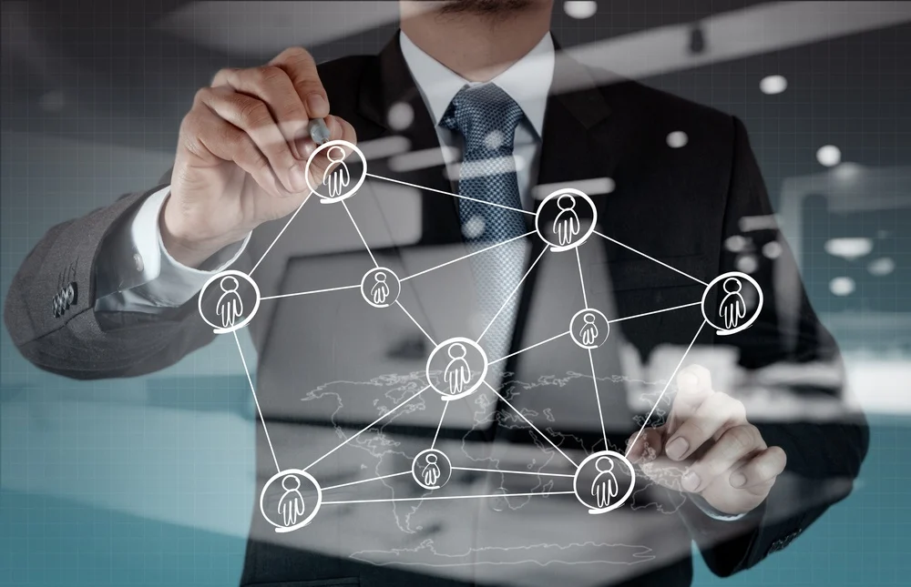 double exposure of businessman working with new modern computer show social network structure.webp