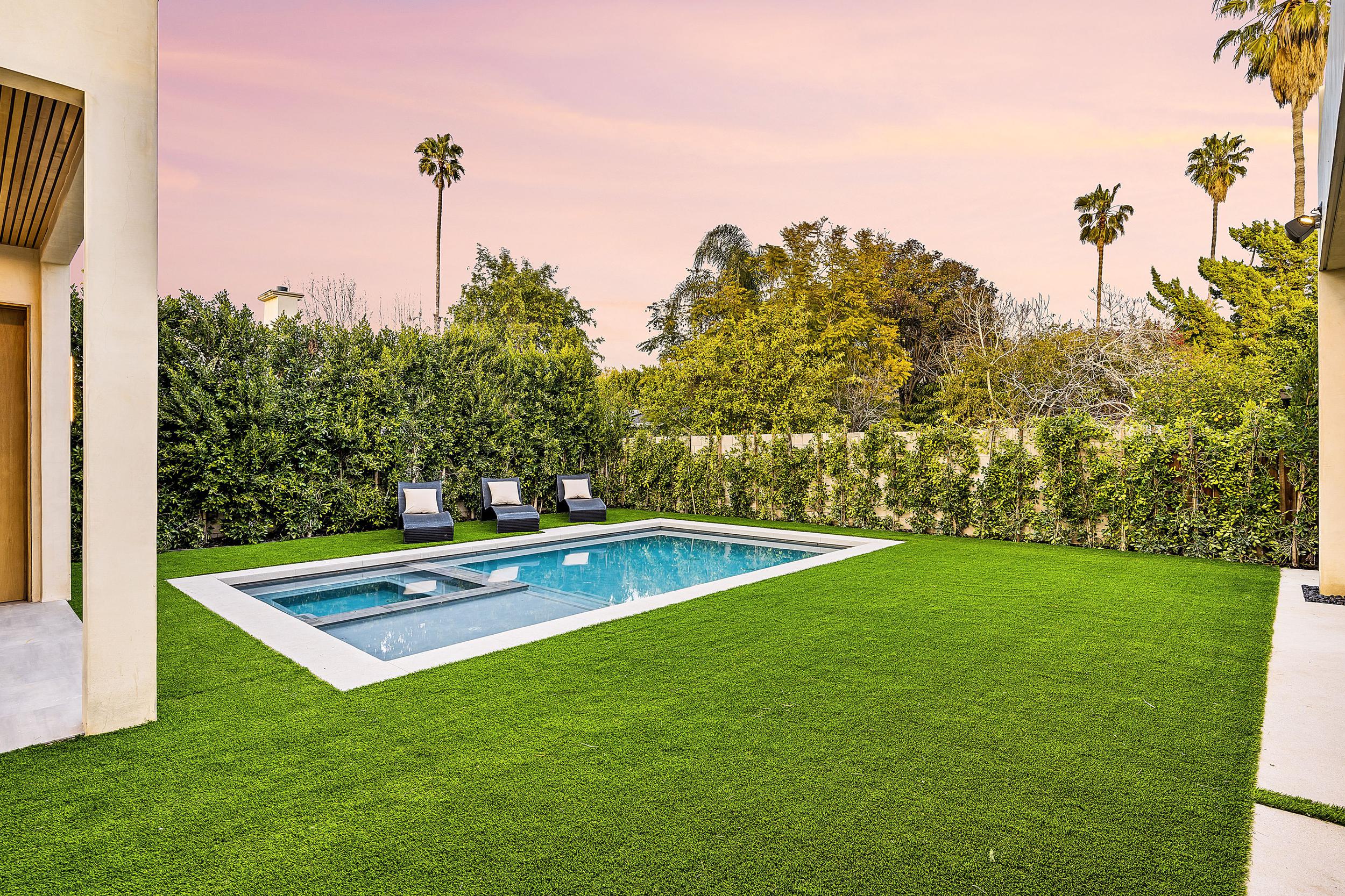 modern-backyard-with-a-pool-and-lounge-chairs-unde-2025-02-10-06-40-21-utc.jpg
