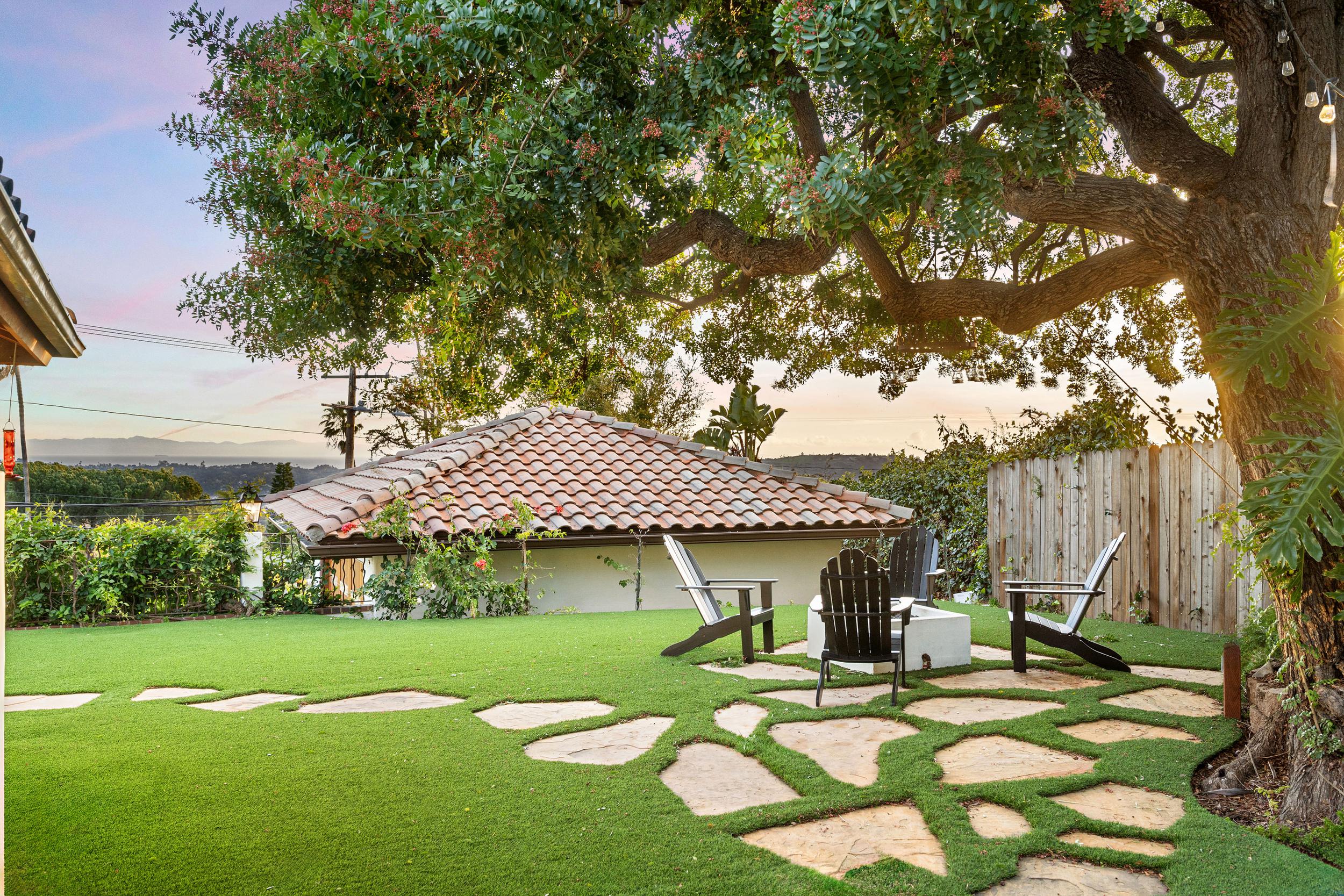 a-nice-backyard-area-with-chairs-table-and-tree-f-2025-02-01-18-52-53-utc.jpg
