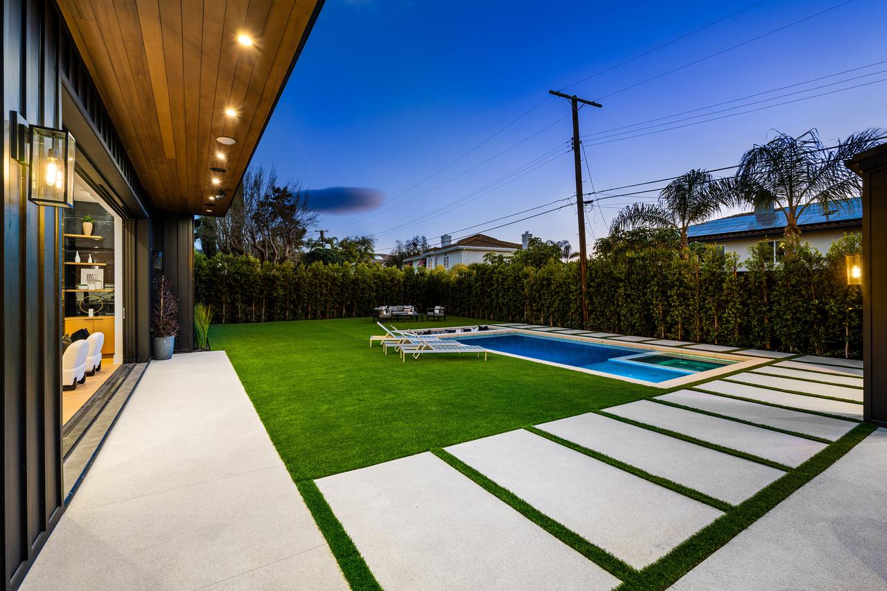 modern-backyard-with-swimming-pool-and-ambient-lig-2025-02-10-06-40-45-utc.jpg
