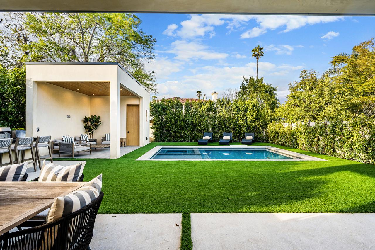 modern-backyard-with-pool-and-seating-area-2025-02-10-06-40-32-utc.jpg