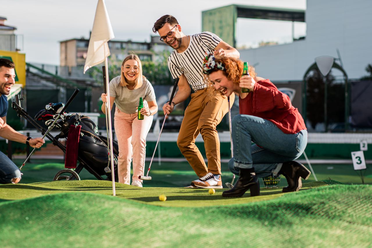 group-of-smiling-friends-enjoying-together-playing-2025-02-11-14-54-59-utc.jpg