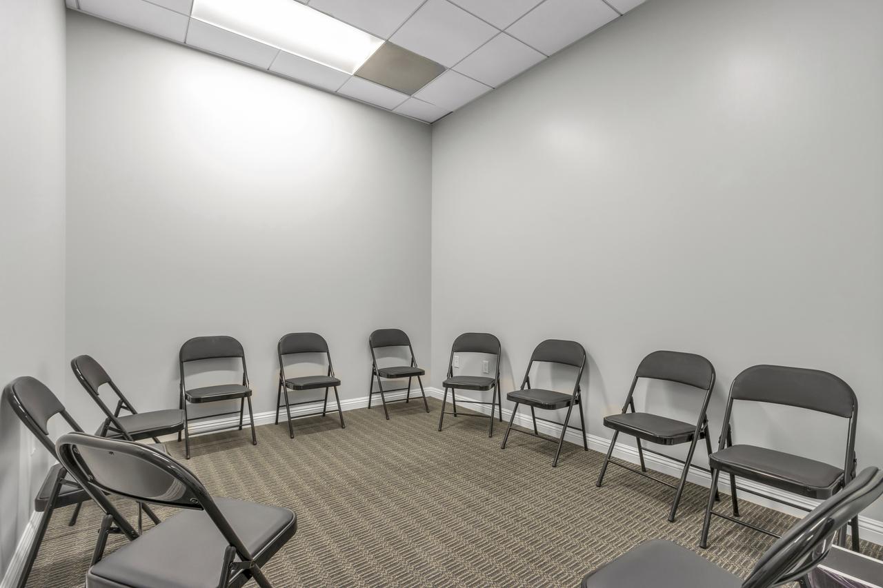 Addiction recovery group therapy room