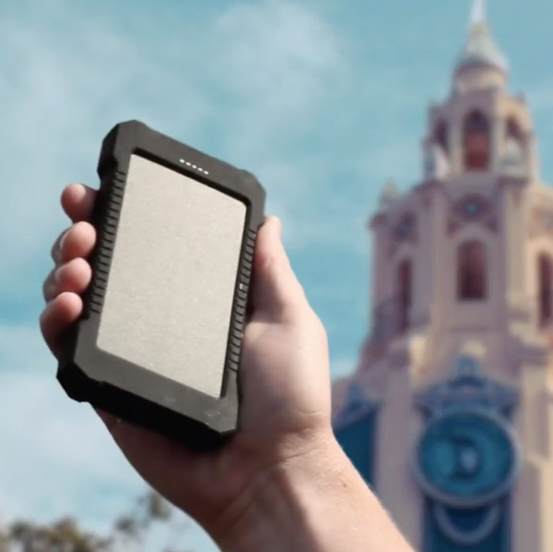 copy of charging in sun - solar powered charger.png