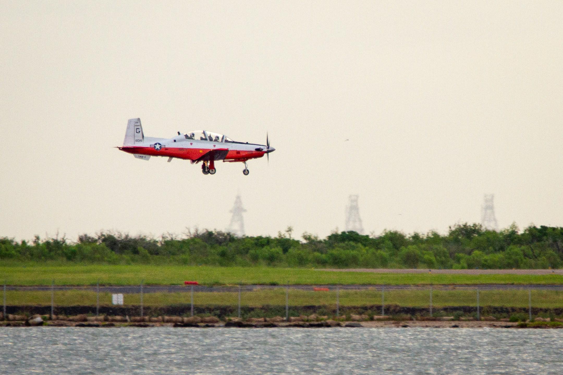 A T-6B Texan 11 comes in for a landing at Naval Air Station Corpus Christi.