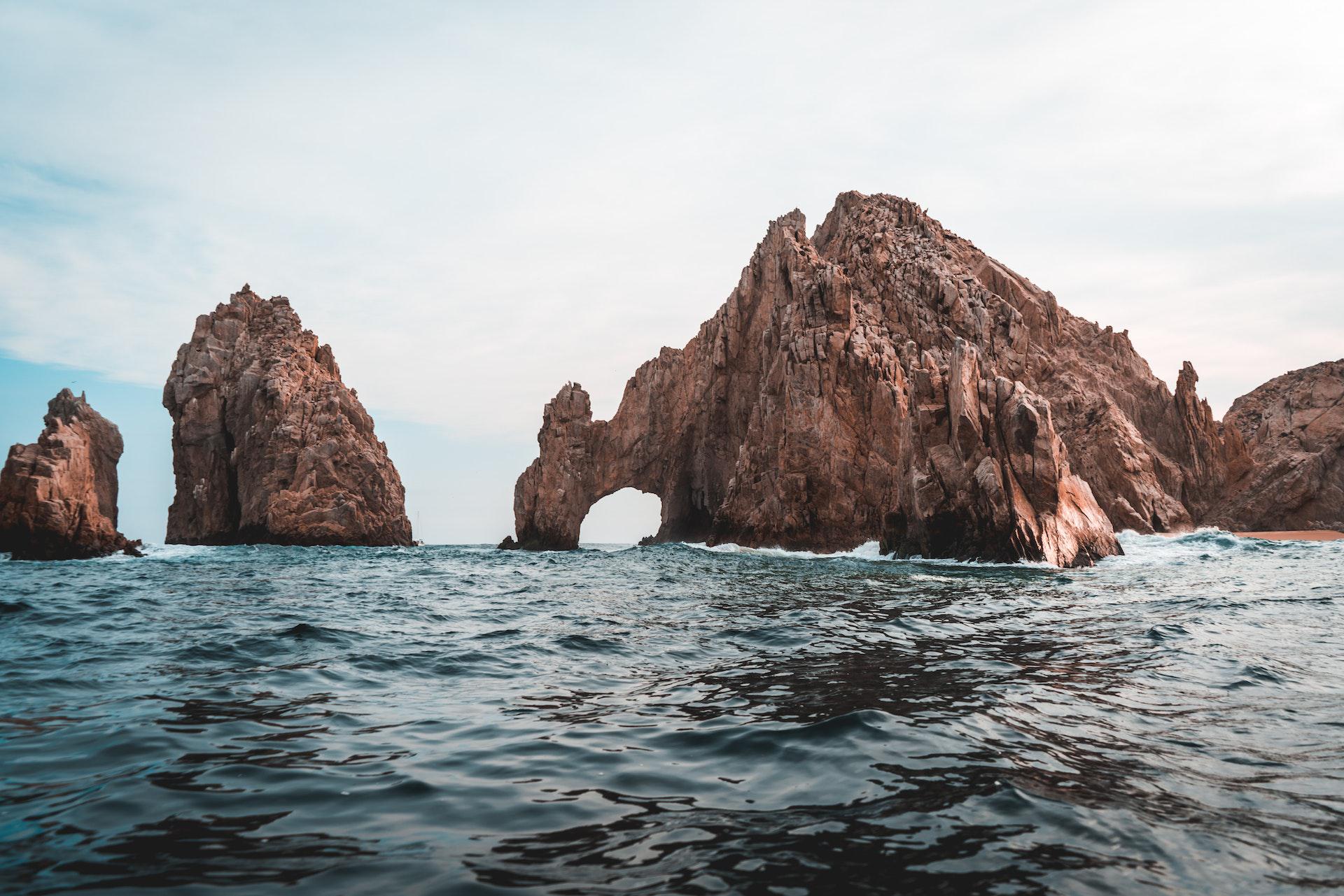 Scenic rocks jutting out of the ocean.