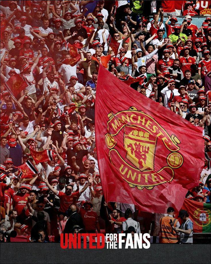 manchester united fans united together celebrating their passion for the club.jpeg