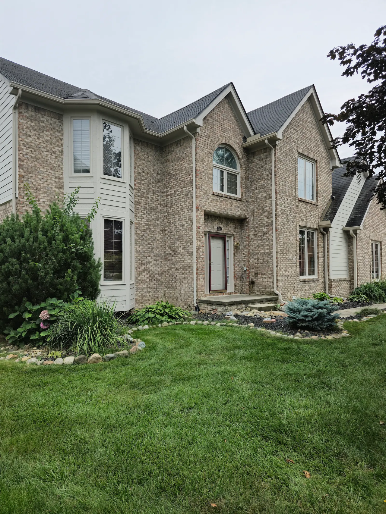 trim-soffit-siding-repaint-northville.webp