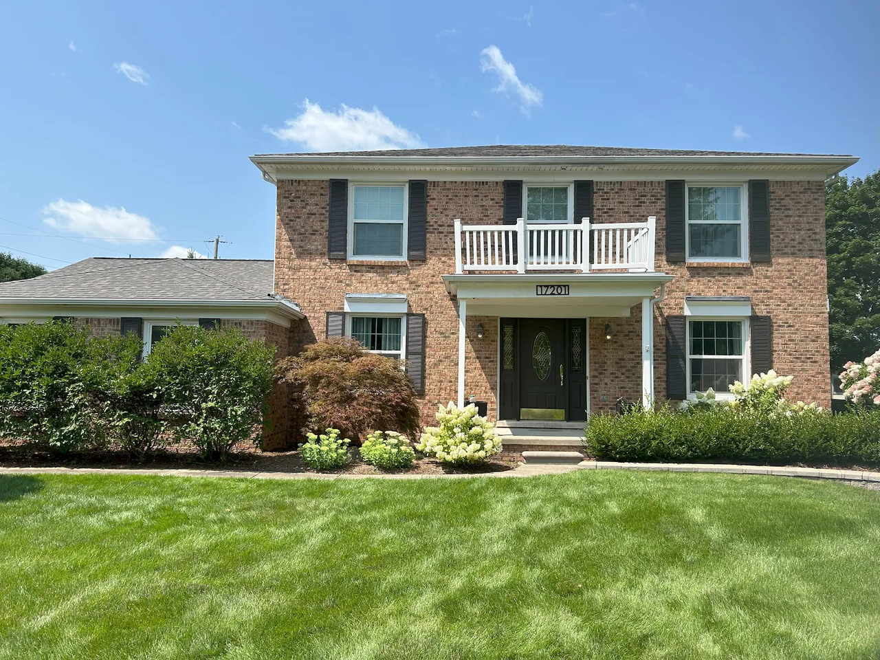 novi-door-sidelights-shutters-exterior.webp