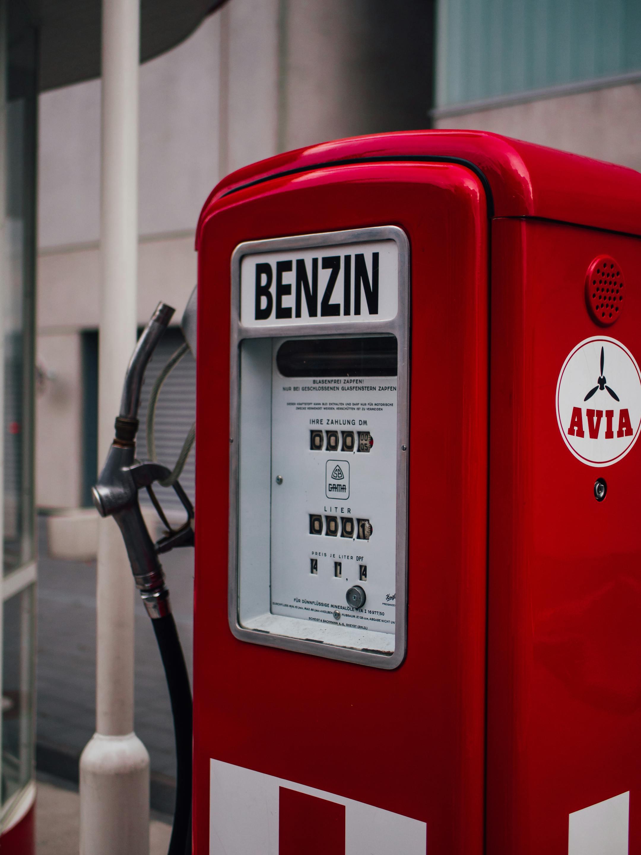 Retro red petrol pump with AVIA branding in Frankfurt, Germany. Classic design and vibrant color.
