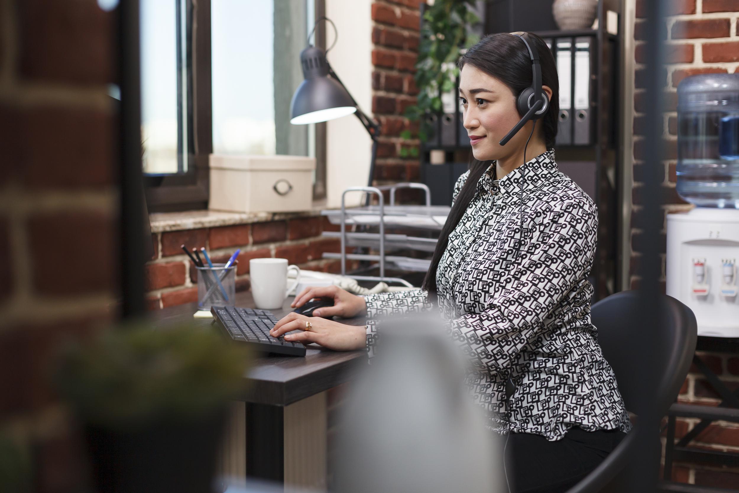 confident-asian-helpline-customer-support-operator-wearing-headset-voicecall-with-client-talking-about-project-financial-risks-call-centre-telemarketer-wearing-headset-call-with-potential-buyer.jpg