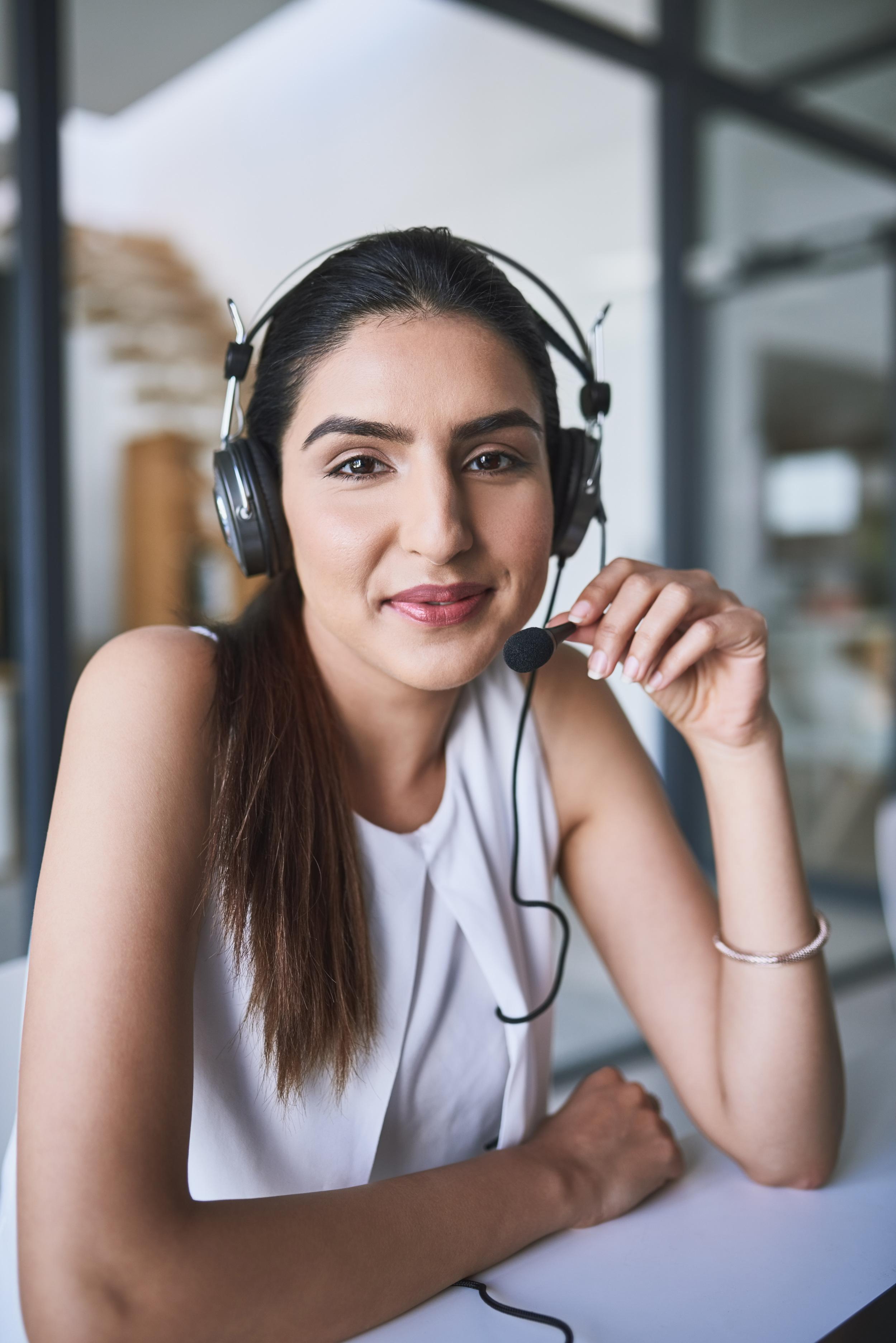 headphones-portrait-woman-call-centre-office-consulting-telemarketing-customer-support-smile-female-agent-headset-service-communication-advice-sales-chat-agency.jpg