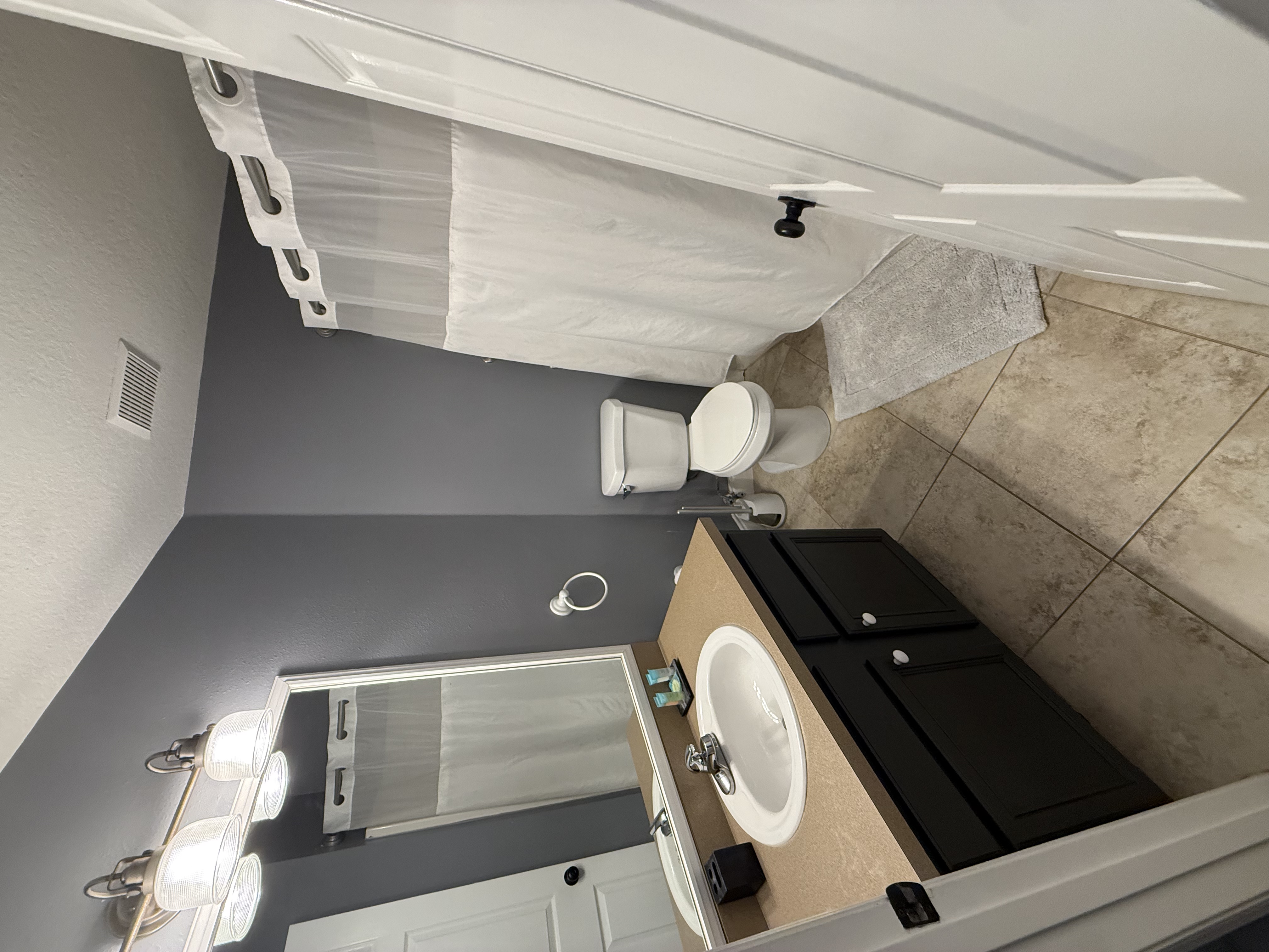 Clean bathroom with restored tiles