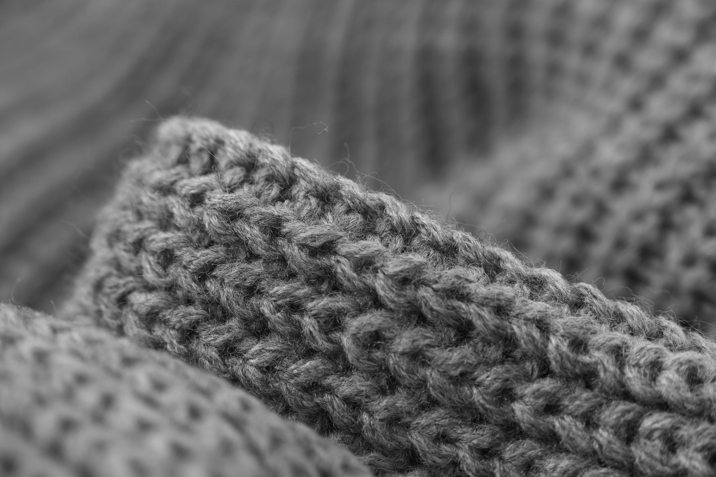 abstract black and white cardigan sweater close up