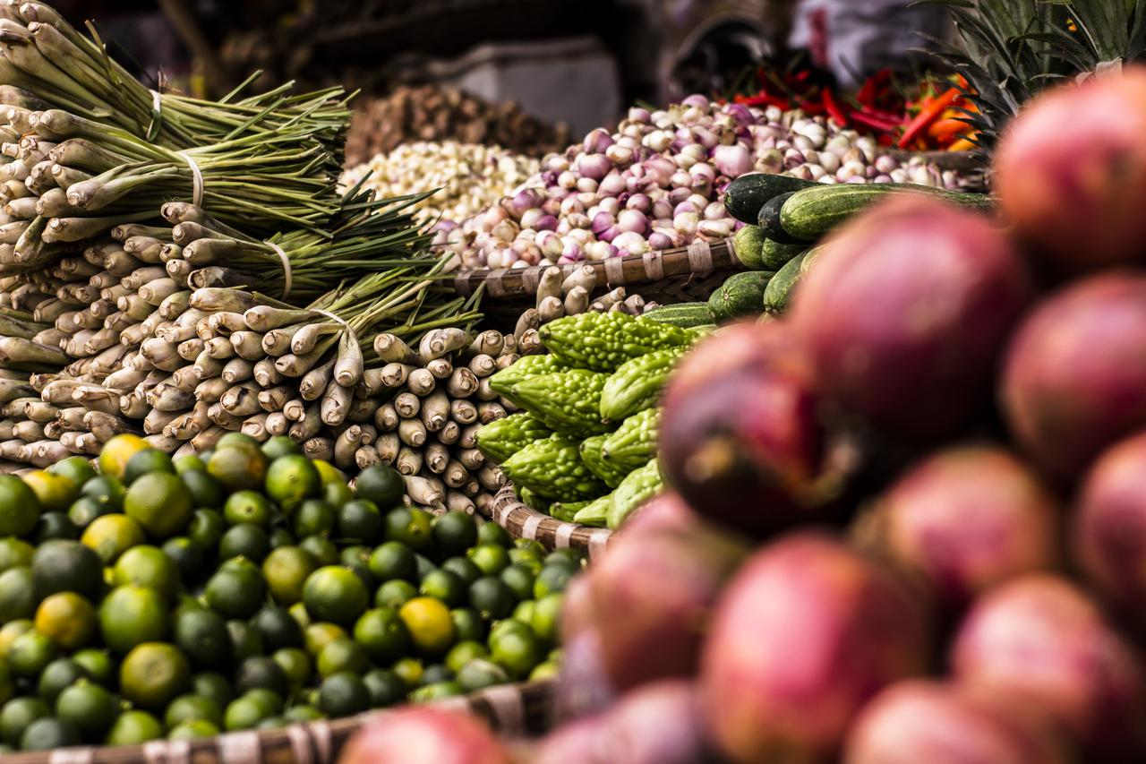 red onions beside bitter gourd